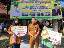 PJ. GUBERNUR RIAU (GUBRI) BERI PENGHARGAAN SISWA SMK NEGERI 1 TAMBUSAI BERPRESTASI